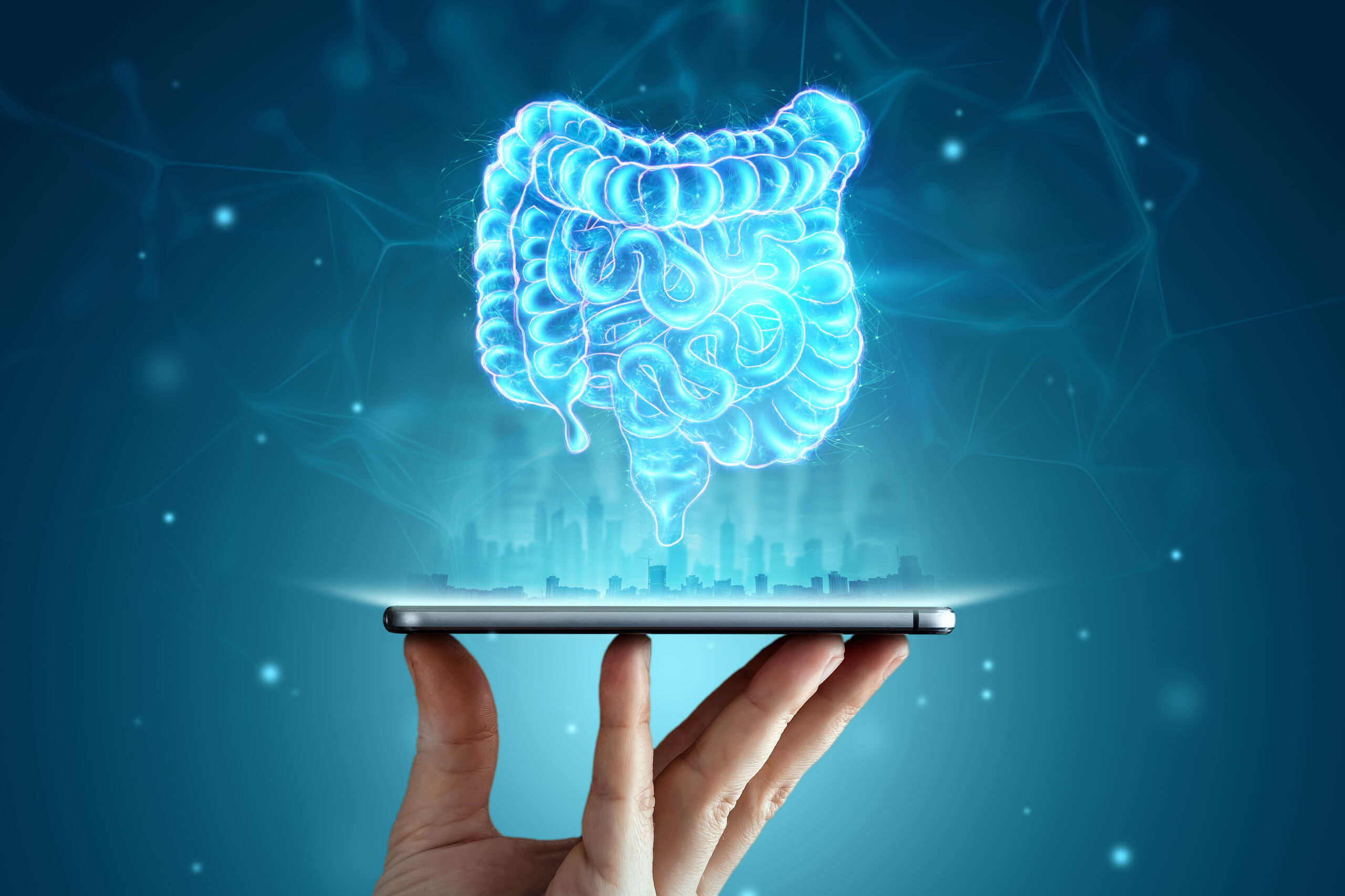 A holographic projection of an intestinal scan over a smartphone. Concept of new technologies, bowel disorder, body scan, digital x-ray, abdominal organs, modern medicine. 3D illustration, 3D render